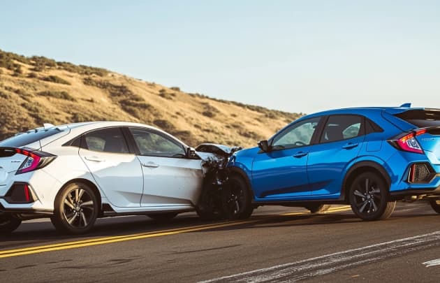 Cars that have collided on a road