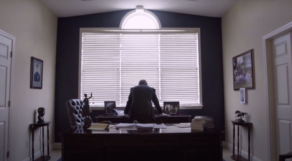 Rob Sullian Facing Window in His Office | The Sullivan Law Firm